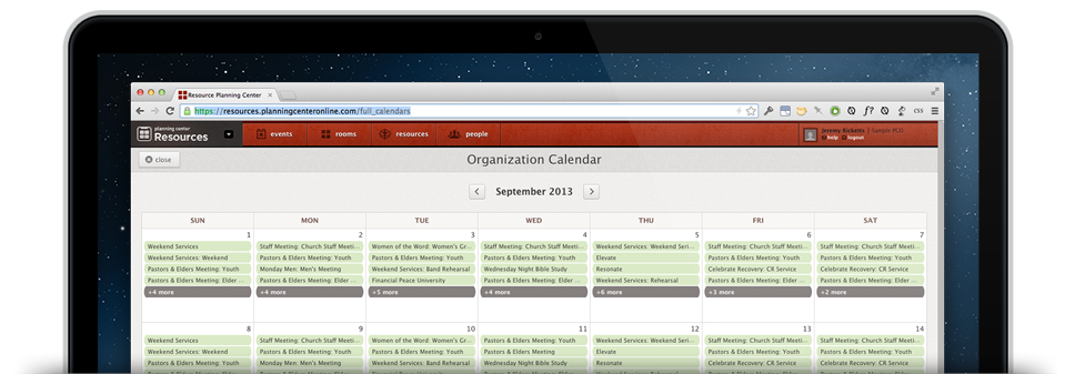 An open laptop displaying a full calendar with events listed out for each day. 